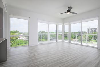 Hardwood-inspired flooring throughout